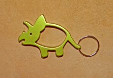 Porte-clés décapsuleur dinosaure Triceratops vert