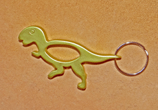 Porte-clés décapsuleur dinosaure Tyrannosaure vert
